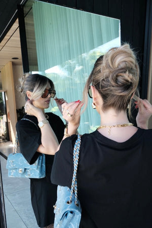 Lia Tee Black by Sneaky Link – Oversized 100% cotton boxy tee with short sleeves, perfect for layering or casual styling with denim.