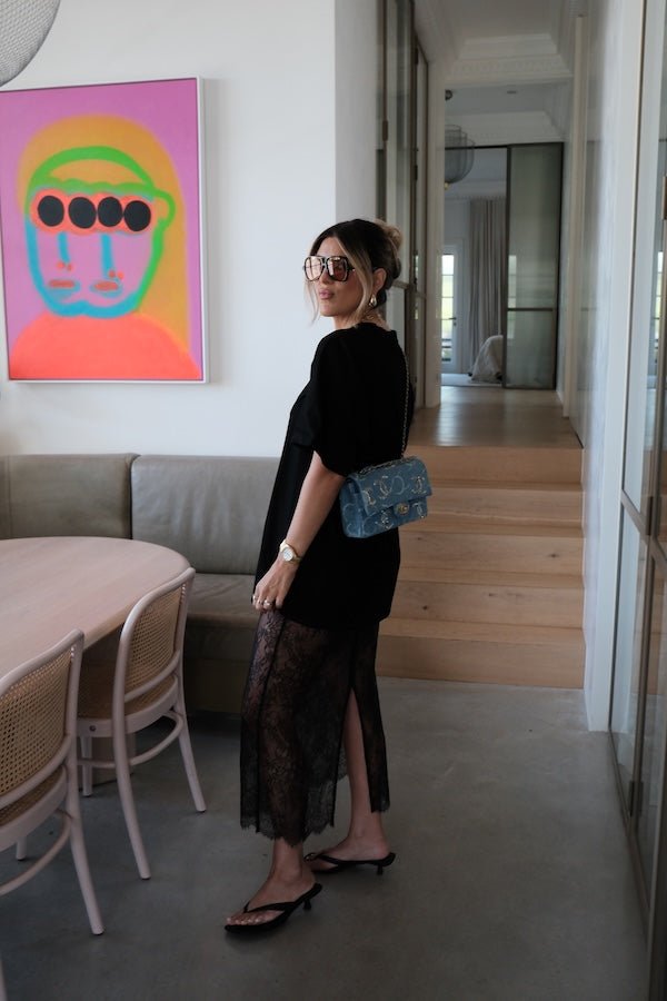 Lia Tee Black by Sneaky Link – Oversized 100% cotton boxy tee with short sleeves, perfect for layering or casual styling with denim.