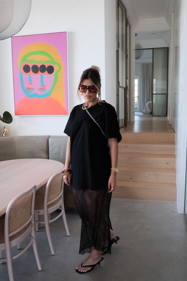 Lia Tee Black by Sneaky Link – Oversized 100% cotton boxy tee with short sleeves, perfect for layering or casual styling with denim.