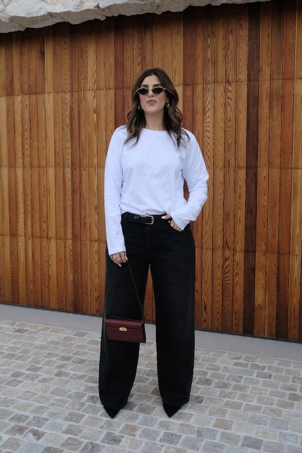 Elisha Baggy Jean Black by Sneaky Link, relaxed mid-rise cotton jeans with branded hardware and signature embroidery. Size down if between sizes.