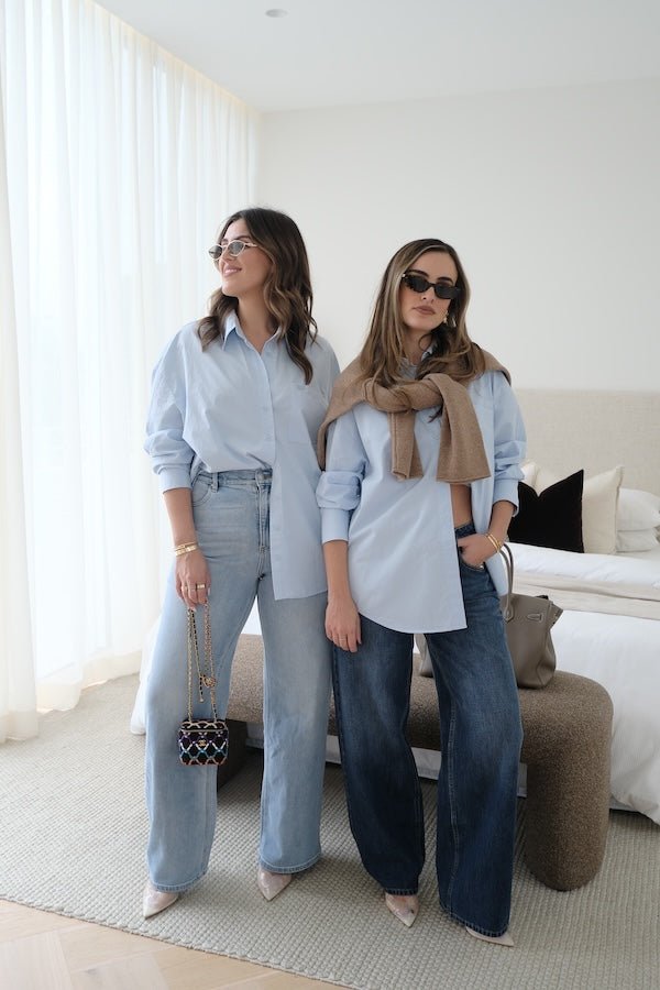 Boston Shirt Light Blue by Sneaky Link — Timeless oversized button-up in crisp cotton poplin with signature snake embroidery on the pocket. Classic, fresh, and versatile.