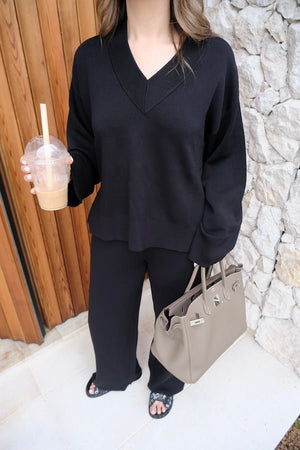 Sneaky Link Lilly Sweater in luxe viscose yarn, an oversized V-neck knit with ribbed trims, perfect for off-duty layering and comfort.