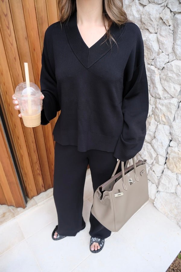 Sneaky Link Lilly Sweater in luxe viscose yarn, an oversized V-neck knit with ribbed trims, perfect for off-duty layering and comfort.