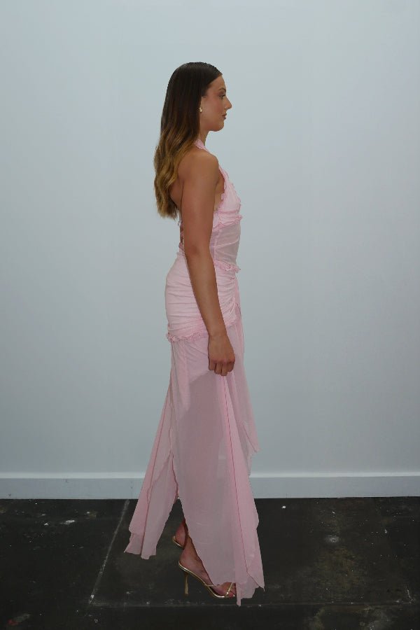 Bianca Set Candy Pink by DŽO — A flirty two-piece with a ruched halter crop top and layered sheer mesh skirt. Delicate ruffles add texture; wear together or separately for versatile looks.