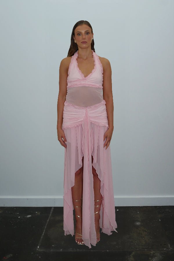 Bianca Set Candy Pink by DŽO — A flirty two-piece with a ruched halter crop top and layered sheer mesh skirt. Delicate ruffles add texture; wear together or separately for versatile looks.