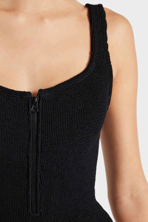 Dallas Swim Black by Hunza G – a sculpting crinkle one-piece with square neckline and front zip. Perfect for bold poolside style.
