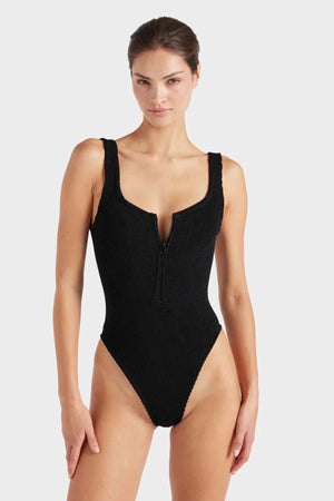 Dallas Swim Black by Hunza G – a sculpting crinkle one-piece with square neckline and front zip. Perfect for bold poolside style.