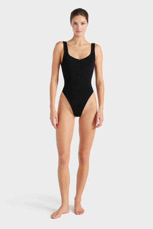 Dallas Swim Black by Hunza G – a sculpting crinkle one-piece with square neckline and front zip. Perfect for bold poolside style.