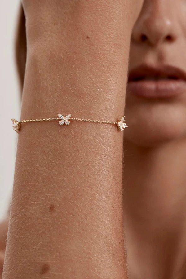 Dancing in the Wind Bracelet by By Charlotte – 18k gold vermeil bracelet with cubic zirconia butterfly pendants.