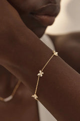 Dancing in the Wind Bracelet by By Charlotte – 18k gold vermeil bracelet with cubic zirconia butterfly pendants.