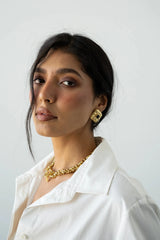 Daphne Earrings Gold by Mountain and Moon – hammered gold earrings with Black Onyx gemstone and sculptural silhouette.