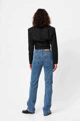 Darcy Shirt in Black by Mossman, a structured cropped cotton shirt with shoulder pads and exposed button front.