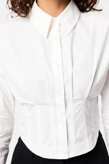 Darcy Shirt in White by Mossman, a structured cropped cotton shirt with shoulder pads and exposed button front.