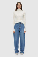 Daya Long Sleeve Top in Cream by Camilla and Marc, fitted funnel neck top with clean lines, high neckline, and baylock finishing, made from 60% acrylic, 20% wool, and 20% nylon.