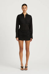 Dean Mini Dress Black by Benni - shirt mini dress with ribbed waist and cowl skirt, designed for a relaxed yet sculpted silhouette.