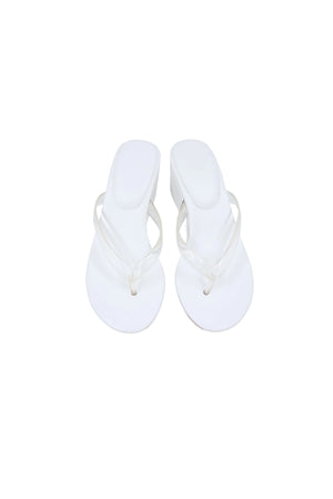Deanna Clear Thong Wedge White Clear by Sneaky Link – a clear strap wedge with cushioned base. Perfect for easy summer styling.