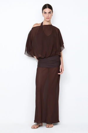 Delilah Overlay Dress in Dark Chocolate by Bec + Bridge, an off-shoulder sheer georgette maxi with removable slip for versatile, elegant occasions.