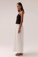 Demi Dress Black/Chalk by Sovere, halter maxi with scooped neckline and flowy skirt, a trendy piece perfect for elegant evenings or events.