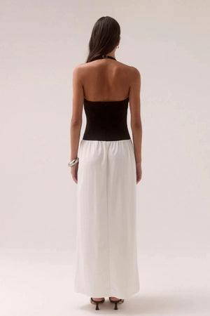 Demi Dress Black/Chalk by Sovere, halter maxi with scooped neckline and flowy skirt, a trendy piece perfect for elegant evenings or events.
