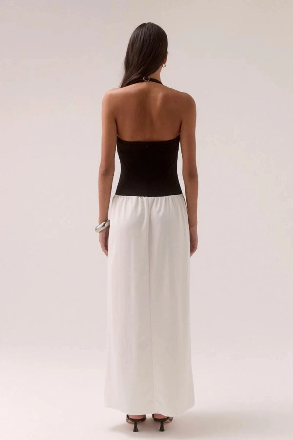 Demi Dress Black/Chalk by Sovere, halter maxi with scooped neckline and flowy skirt, a trendy piece perfect for elegant evenings or events.