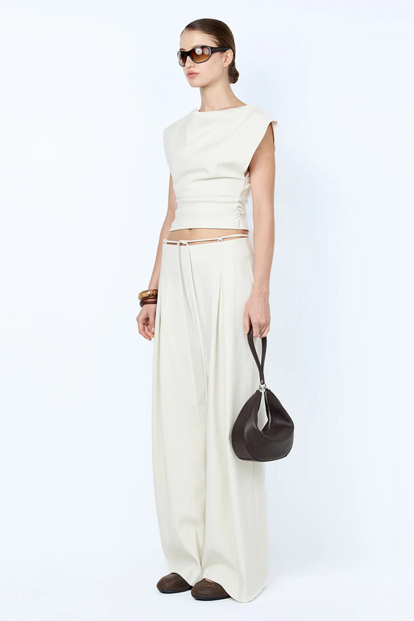 Devyn Cowl Top by Bec + Bridge — cream suiting top with boat neckline, fitted waist, and soft gathers for elevated styling.