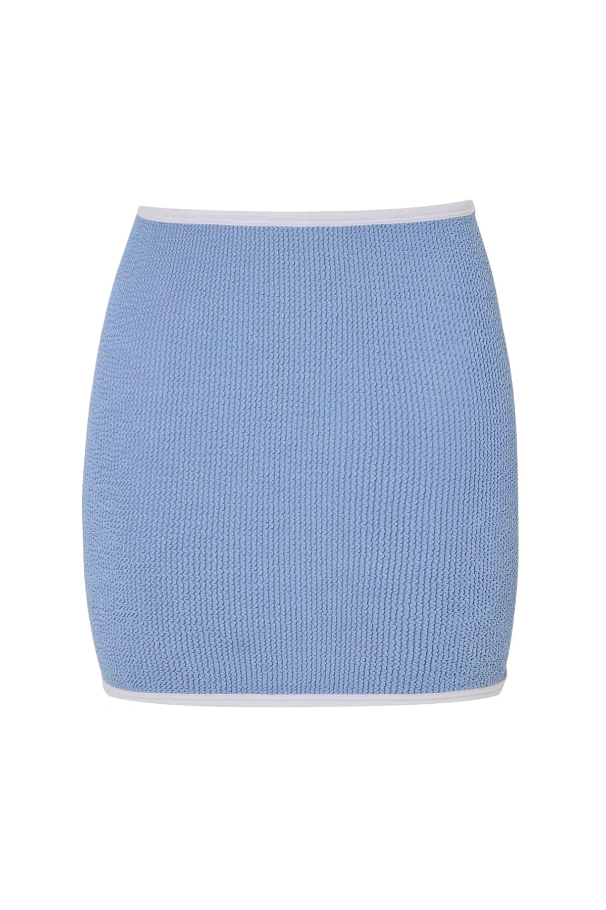 Devyn Swimskirt by Hunza G, a crinkle-textured piece worn as a tube top or skirt. Perfect for beach layering or versatile summer styling.