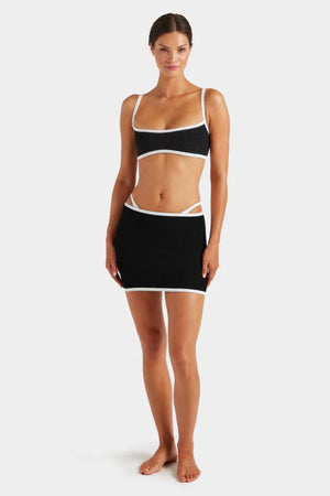 Devyn Swimskirt by Hunza G, versatile crinkle design that flatters as a mini swim skirt or tube top. Ideal for sunny seaside adventures.