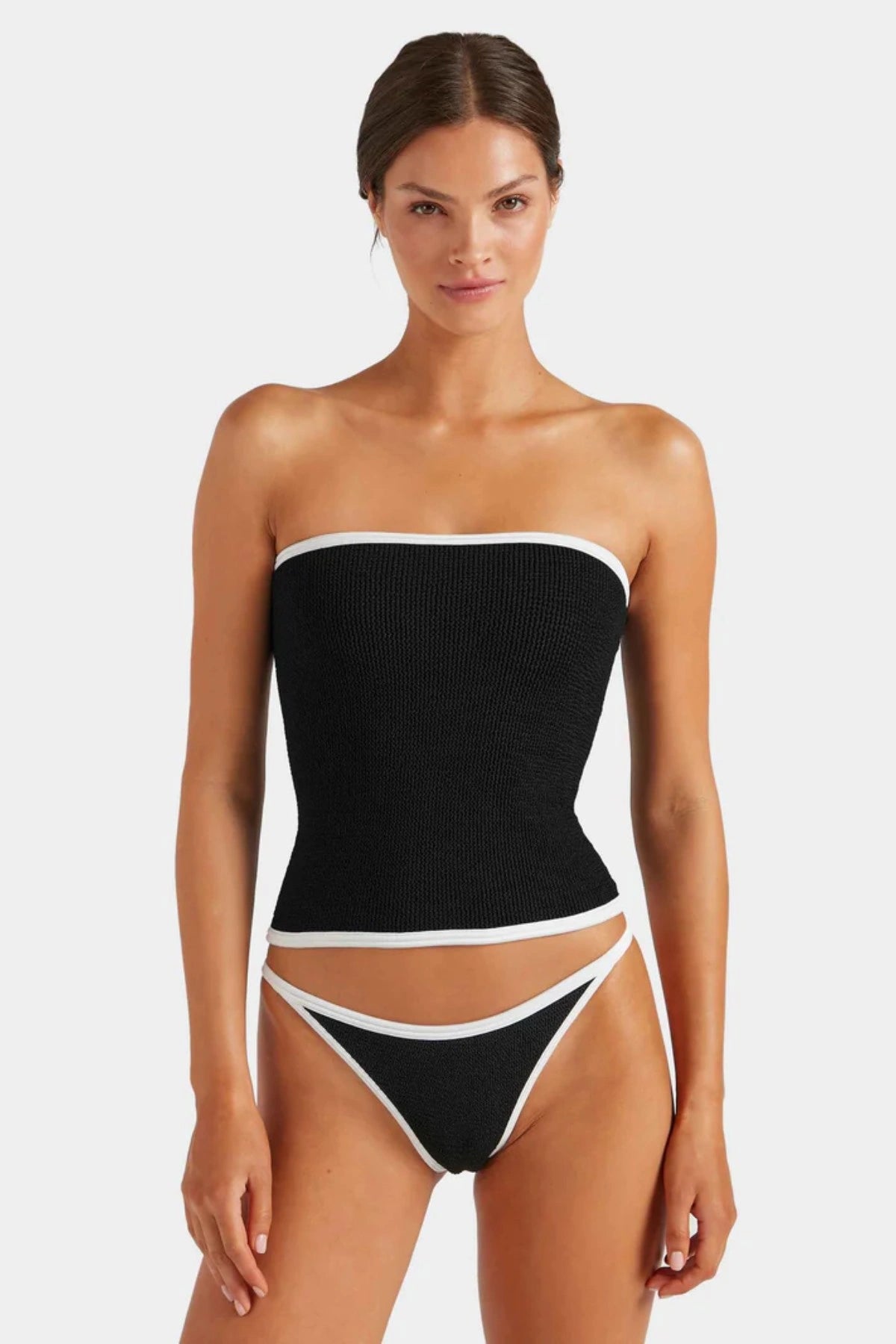 Devyn Swimskirt by Hunza G, versatile crinkle design that flatters as a mini swim skirt or tube top. Ideal for sunny seaside adventures.