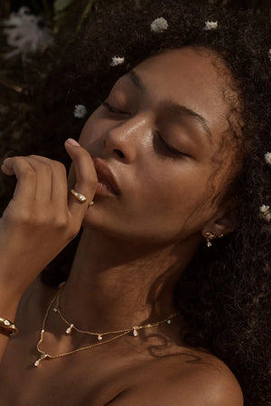 Dewdrop Ring by By Charlotte, gold vermeil open band with marquise and pear-cut cubic zirconias, a trendy piece perfect for layering or meaningful gifting.