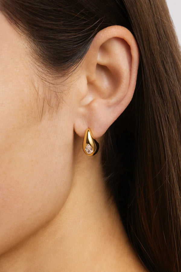 Dewdrop Small Earrings by By Charlotte, gold vermeil drop studs with pear-cut cubic zirconias, a trendy piece perfect for everyday elegance or gifting.