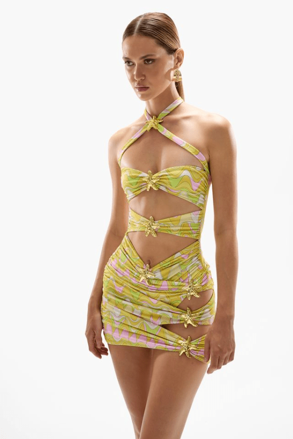 Diamond Seastar Swimsuit Wavy Gold by Cin Cin Swim, cutout swimsuit with gold print and hardware. Perfect for beach days or statement styling.