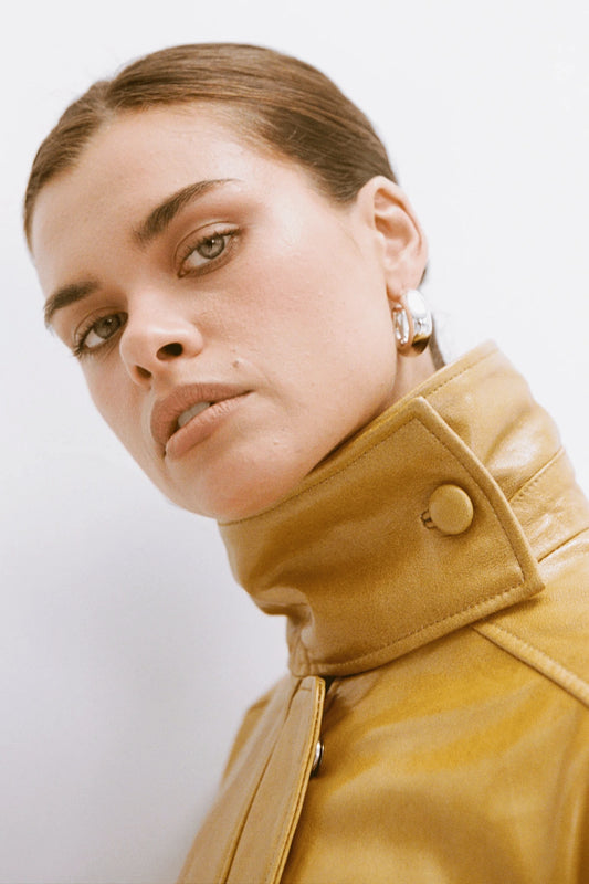 Dina Hoops White Gold by Porter Jewellery – glossy statement hoop earrings with sterling silver base, water-resistant and hypoallergenic.
