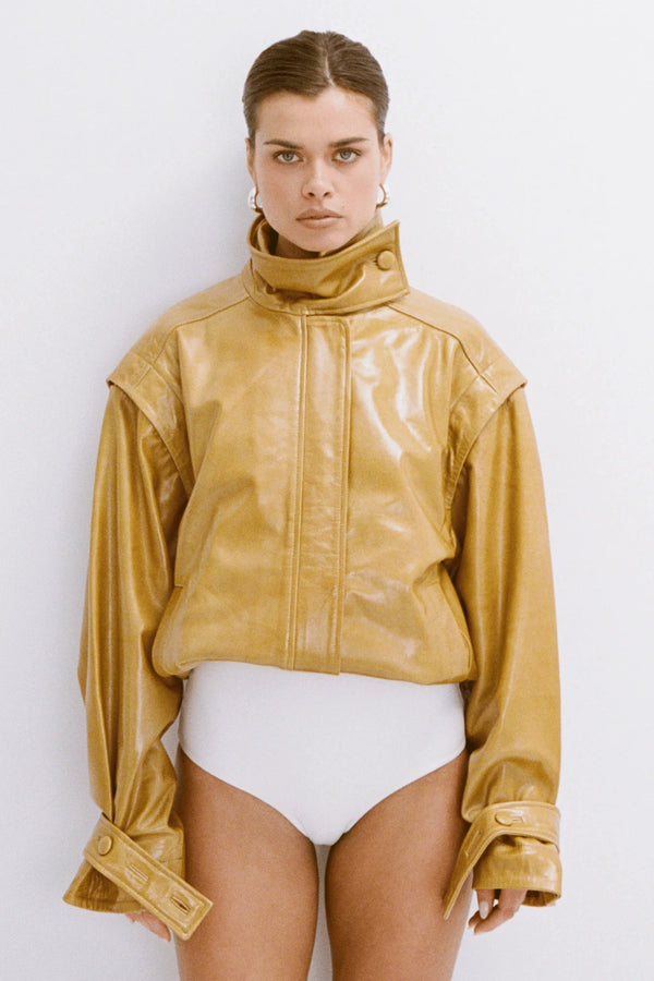 Dina Hoops White Gold by Porter Jewellery – glossy statement hoop earrings with sterling silver base, water-resistant and hypoallergenic.
