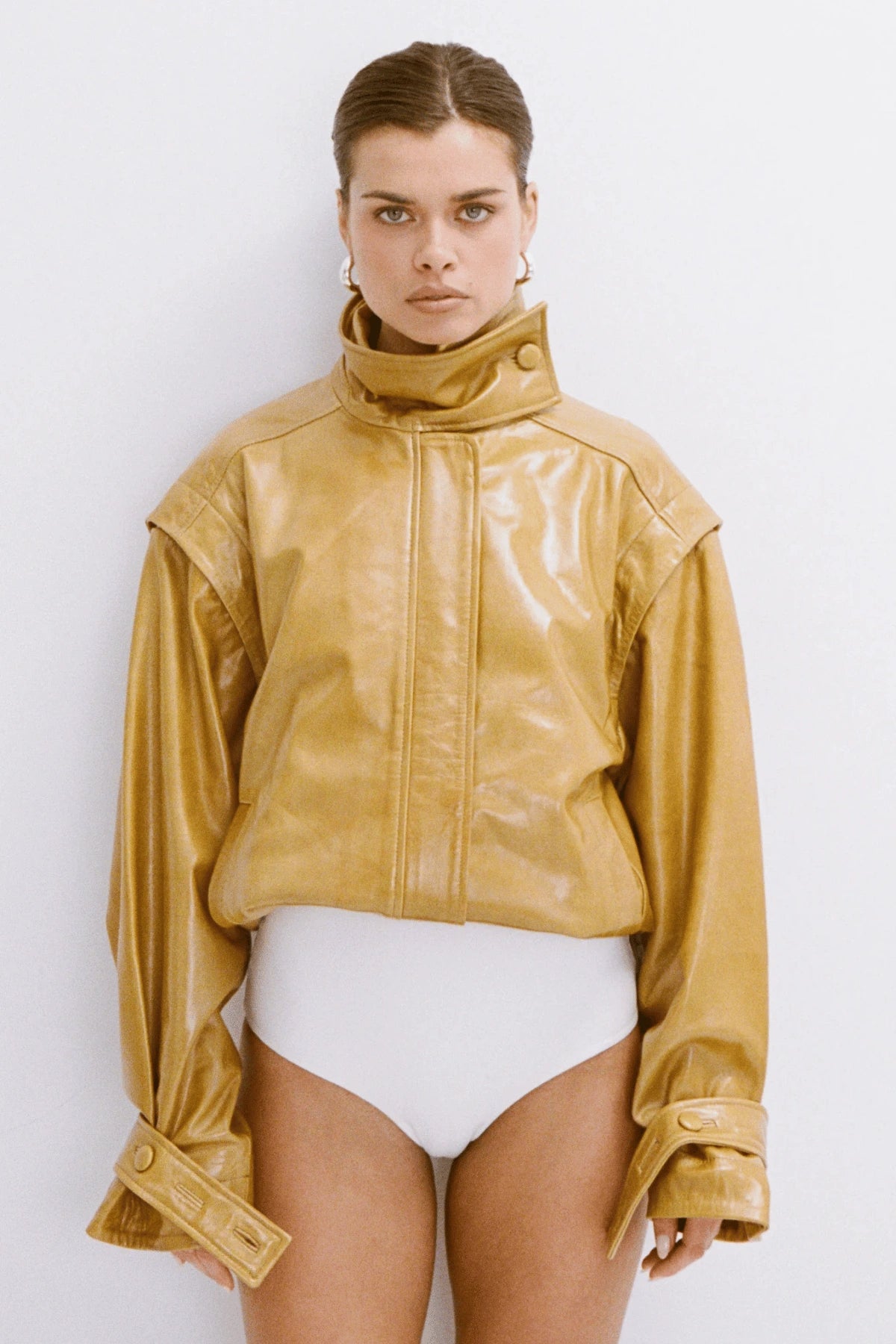 Dina Hoops White Gold by Porter Jewellery – glossy statement hoop earrings with sterling silver base, water-resistant and hypoallergenic.
