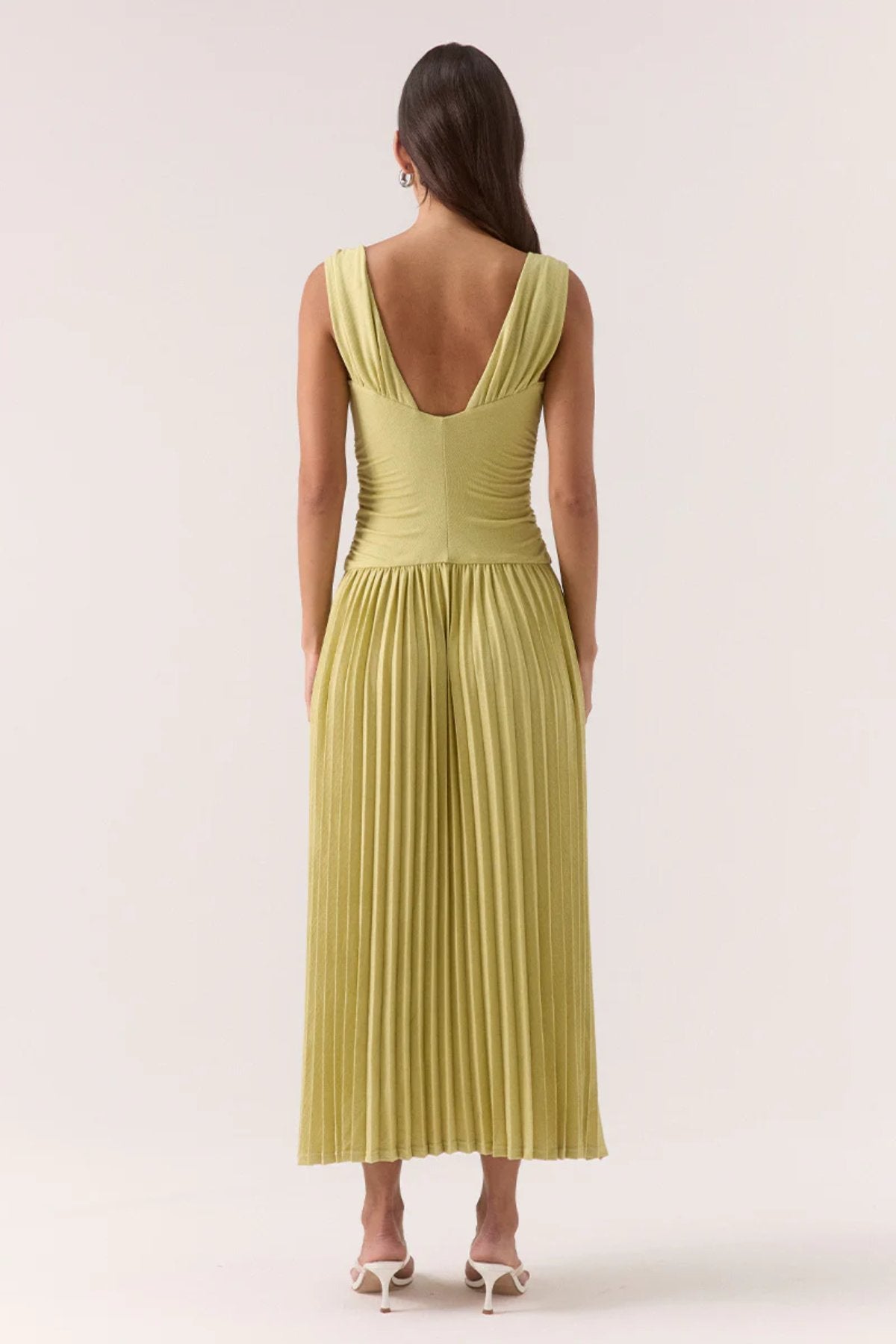 Dione Dress Apple by Sovere, sculptural stretch-rayon midi with layered bralette, gathered bust, and pleated skirt for structured yet effortless elegance.