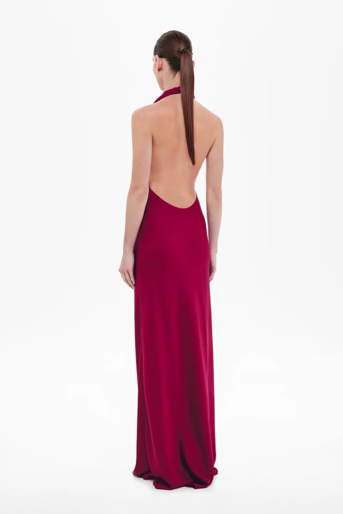 Donna Satin Dress in Jester Red by Misha, a plunging open-back gown with metallic ring detail and fluid draping for sultry sophistication.