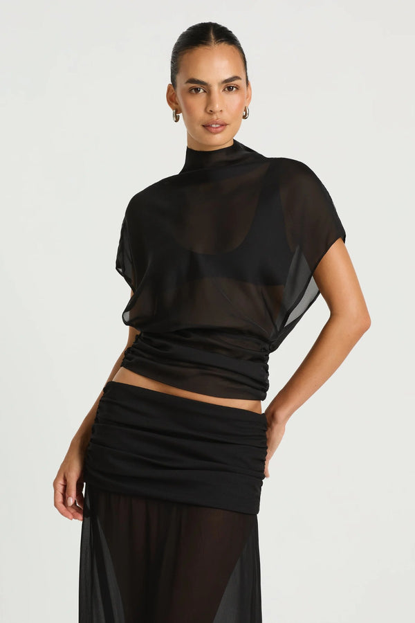 Dorothea Top in Black by Benni, a draped chiffon top with a high neckline, gathered waist detail, and optional matching bralette.
