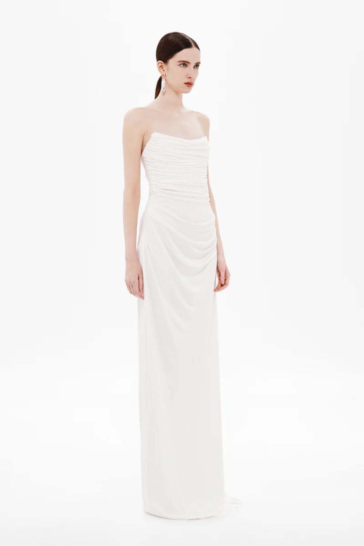 Dry Jersey Draped Dress by Misha, a strapless midi in soft dry jersey with corset bodice and sculpted draping for timeless, bridal-inspired elegance.