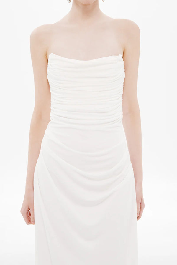 Dry Jersey Draped Dress by Misha, a strapless midi in soft dry jersey with corset bodice and sculpted draping for timeless, bridal-inspired elegance.