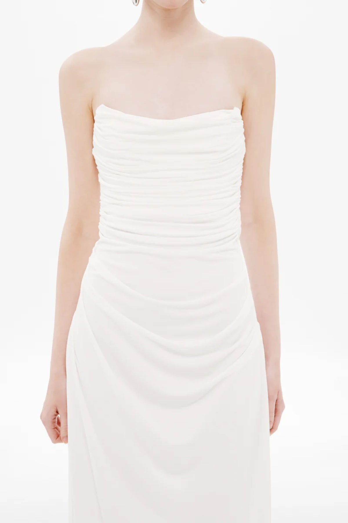 Dry Jersey Draped Dress by Misha, a strapless midi in soft dry jersey with corset bodice and sculpted draping for timeless, bridal-inspired elegance.