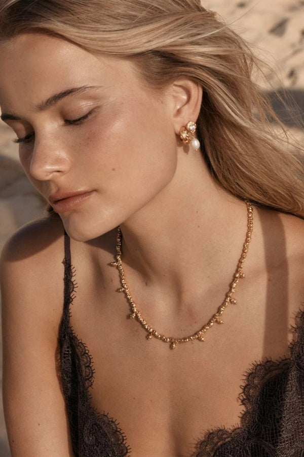 Dubai Necklace by Amber Sceats - gold necklace with textured teardrop pendants, designed for bold elevated styling.