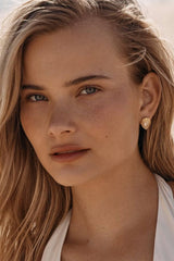 Dune Earrings by Amber Sceats - gold earrings with teardrop crystals and polished frame, designed for elegant everyday styling.