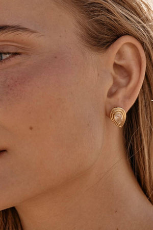 Dune Earrings by Amber Sceats - gold earrings with teardrop crystals and polished frame, designed for elegant everyday styling.