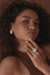 Duomo Earrings by Amber Sceats, sculptural gold-plated hoops with oversized freshwater pearl, a bold trendy piece perfect for timeless elegance.