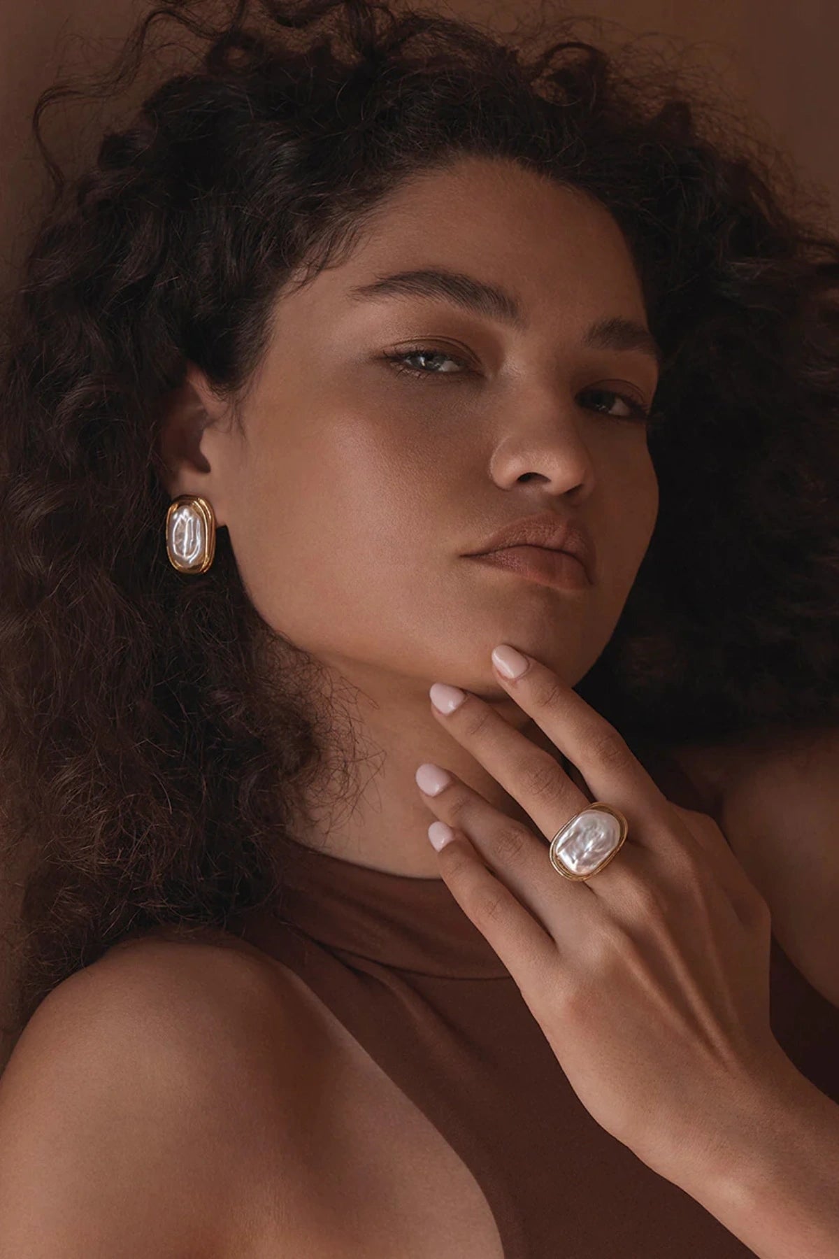 Duomo Earrings by Amber Sceats, sculptural gold-plated hoops with oversized freshwater pearl, a bold trendy piece perfect for timeless elegance.