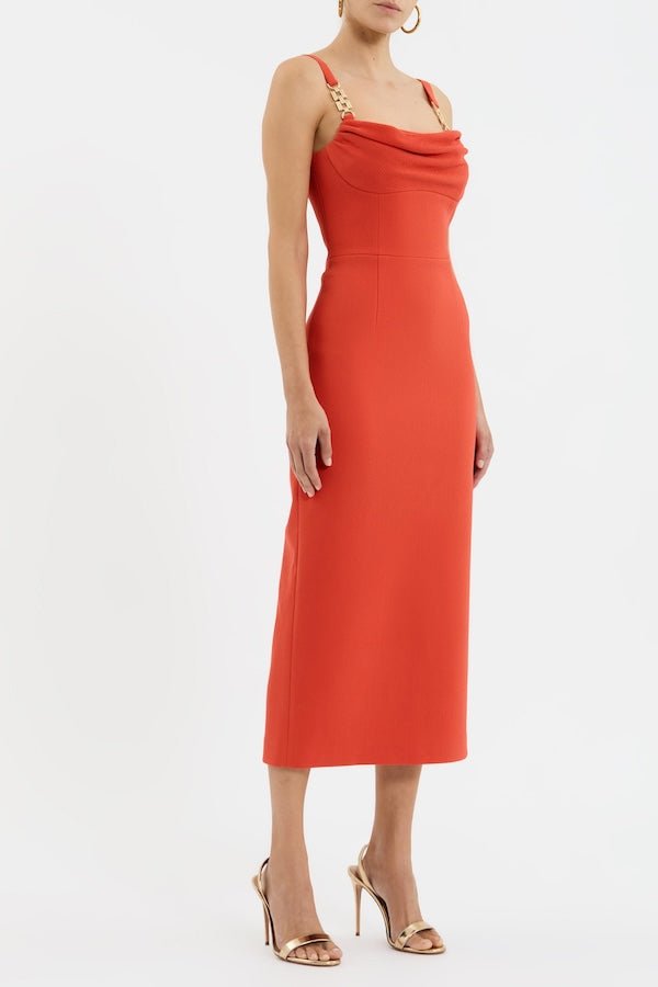 Empress Midi Dress Orange by Rebecca Vallance – Trendy fitted midi with draped neckline and gold chain straps, perfect for cocktail parties and elegant occasions.