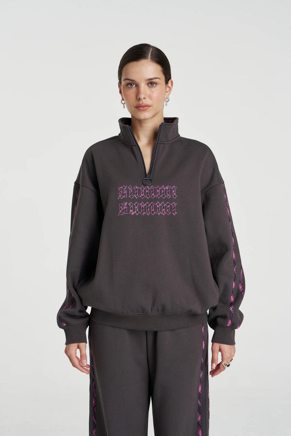 Eden Zip Neck Jumper Shadow by Summi Summi – acid wash cotton jumper with zip neck and plaid trim details.