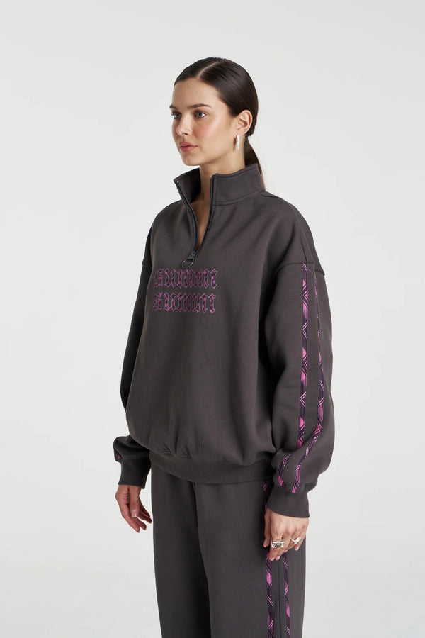 Eden Zip Neck Jumper Shadow by Summi Summi – acid wash cotton jumper with zip neck and plaid trim details.