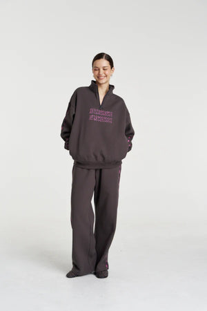 Eden Zip Neck Jumper Shadow by Summi Summi – acid wash cotton jumper with zip neck and plaid trim details.