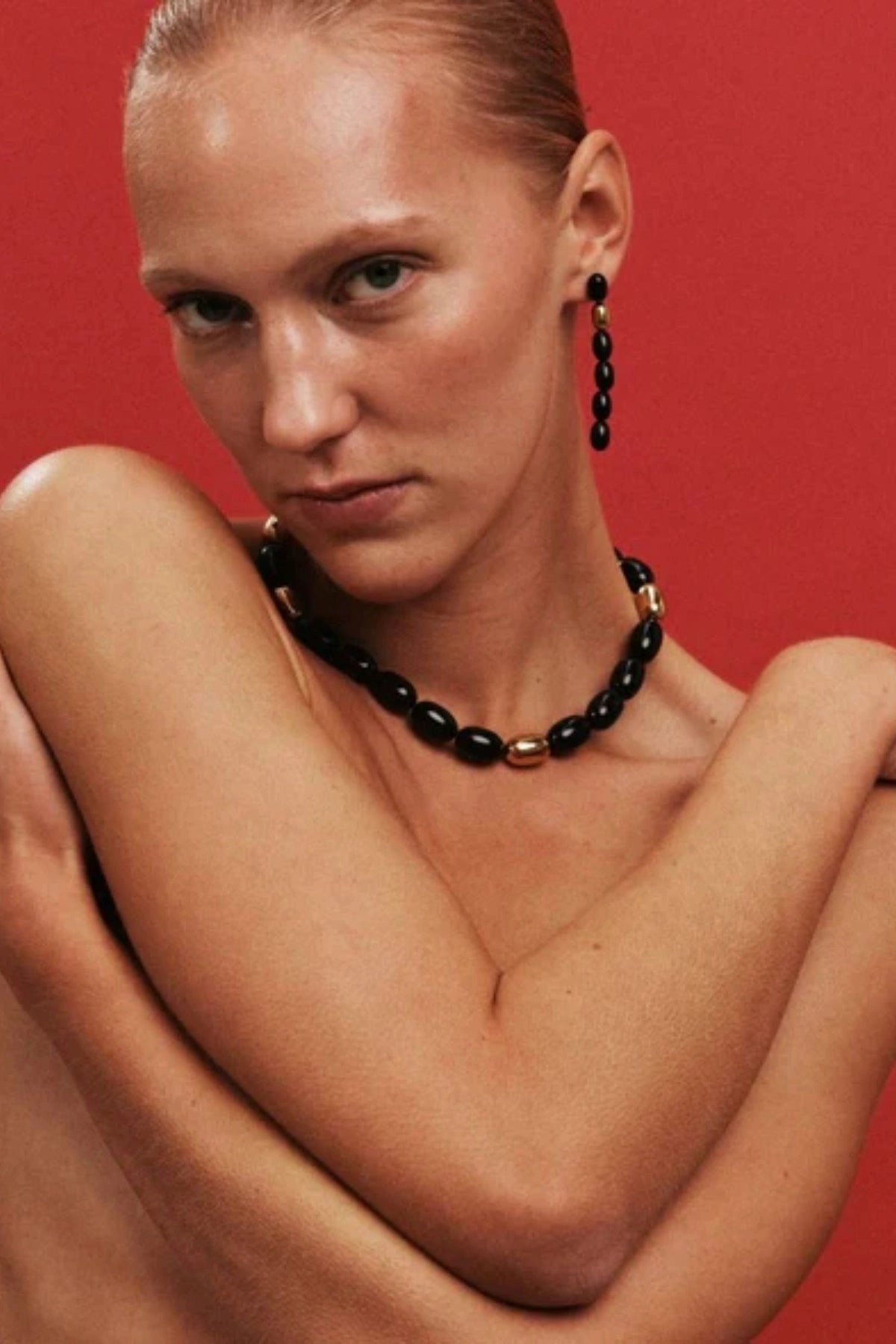 Edith Earrings in Black/Gold by Heaven Mayhem – gold twisted-bead drop earrings with sculptural movement and shine, perfect for refined everyday styling.